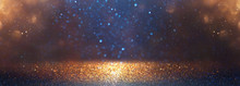 Blackground Of Abstract Glitter Lights. Blue, Gold And Black. De Focused. Banner