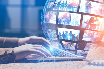 Woman with laptop using video streaming technology