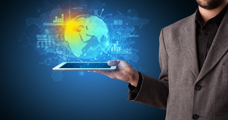 Poster - Hand holding tablet with global database concept