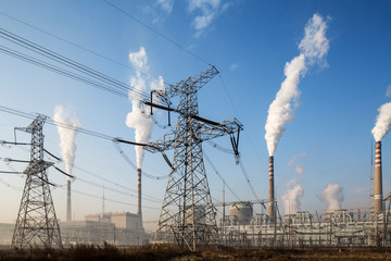 Sticker - China, Shanxi Province, Datong, Steam and smoke rises from smokestacks at coal-fired Datong No. 2 Power Station at dawn