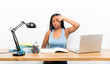 © luismolinero - African American teenager student girl with long braided hair in her workplace with tired and sick expression