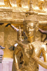 Sticker - Thailand, Bangkok. Gold statue at Wat Phra Kaew Temple near Grand Palace.