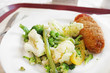 © Gelia - Lunch of the Kyiv cutlet, broccoli, cauliflower and asparagus on the white plate