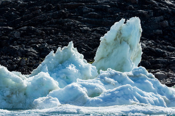 Wall Mural - Canada, Nunavut Territory, Melting icebergs along shoreline of Frozen Channel at northern edge of Hudson Bay near Arctic Circle