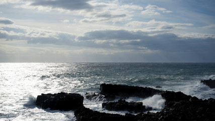 Poster - Italy, Sicily, the Ionian sea coast at Stazzo, Aci Reale, Catania. Black lava stones.