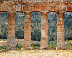 Poster - Italy, Sicily, Segesta. Doric columns frame the view through the columns from Segesta on Sicily, Italy.