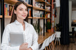 © Anastasia - woman with tablet smiling in the office