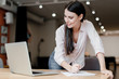 © Anastasia - woman writing info from laptop to paperwork