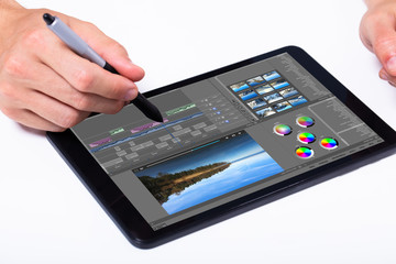 Aufkleber - Editor editing video on tablet