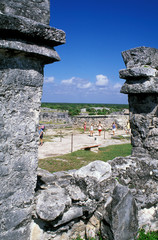 Central America, Mexico, Yucatan, Tulum. People touring ruins