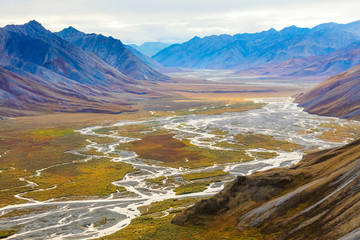 usa, alaska, brooks range, arctic national wildlife refuge. aerial with mountains and ivishak river.
