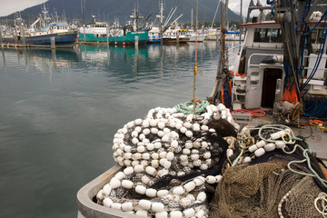 Canvas Print - USA, Alaska, Petersburg. Fishing boats and nets in harbor. 