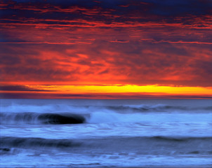 Sticker - USA, California, Del Norte Co. Dramatic clouds and breaking waves end the day on the coast in Del Norte County, California.