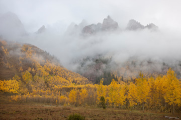 Sticker - USA, Colorado, Aspen. Sievers Mountain with clouds swirling among its spires above the Maroon Valley. 