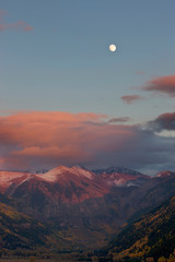 Poster - USA, Colorado, San Juan Mountains, Telluride. A full moon rises above the mountains at sunset 