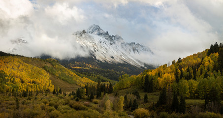 Poster - USA, Colorado, Sneffels Range. Snow clouds over mountain landscape at sunset. 