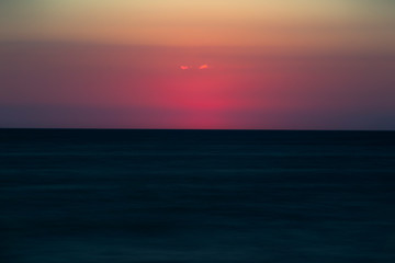 Sticker - A peaceful sunset afterglow off the west coast of Florida