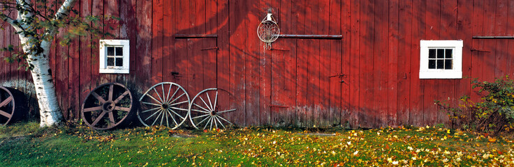 usa, new hampshire, franconia notch. autumn color enhances the deep red siding of an old barn near f