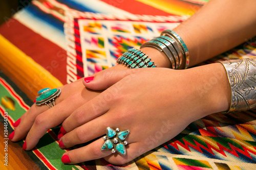 Fotomural Model displaying Jewelry for Sale, Santa Fe, New Mexico, USA.