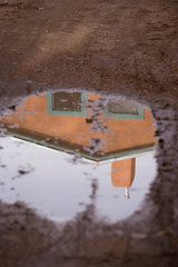 Sticker - NA, USA, New Mexico, Santa Fe, Adobe Home reflected in puddle after rainstorm 