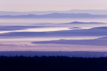 Wall Mural - USA, Oregon, Crater Lake National Park. Purple haze hangs over valley. 