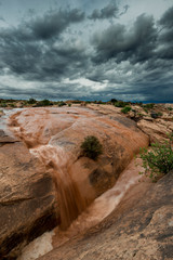 Poster - USA, Utah. Flach flood and storm clouds, Arches National Park