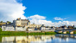 Beautiful view on the skyline of the historic city of Amboise with renaissance chateau across the river Loire. Loire valley, France