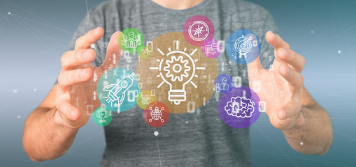 Poster - cloud of colorfull start up icon bubble with data businessman holding a binary 3d rendering
