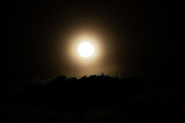 Wall Mural - Moon light behind cloud