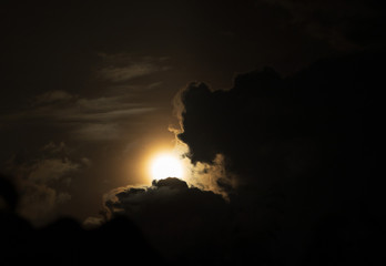 Wall Mural - Moon light behind cloud