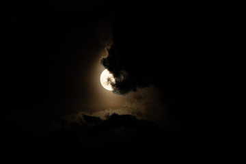 Wall Mural - Moon light behind cloud