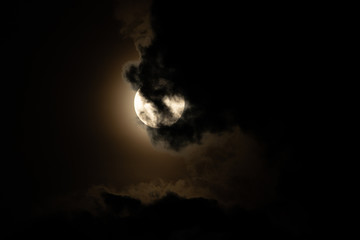 Wall Mural - Moon light behind cloud