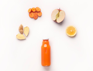 Wall Mural - Orange detox drink with flying components on white