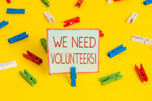 Conceptual Hand Writing Showing We Need Volunteers. Concept Meaning Someone Who Does Work Without Being Paid For It Colored Clothespin Papers Empty Reminder Yellow Floor Office