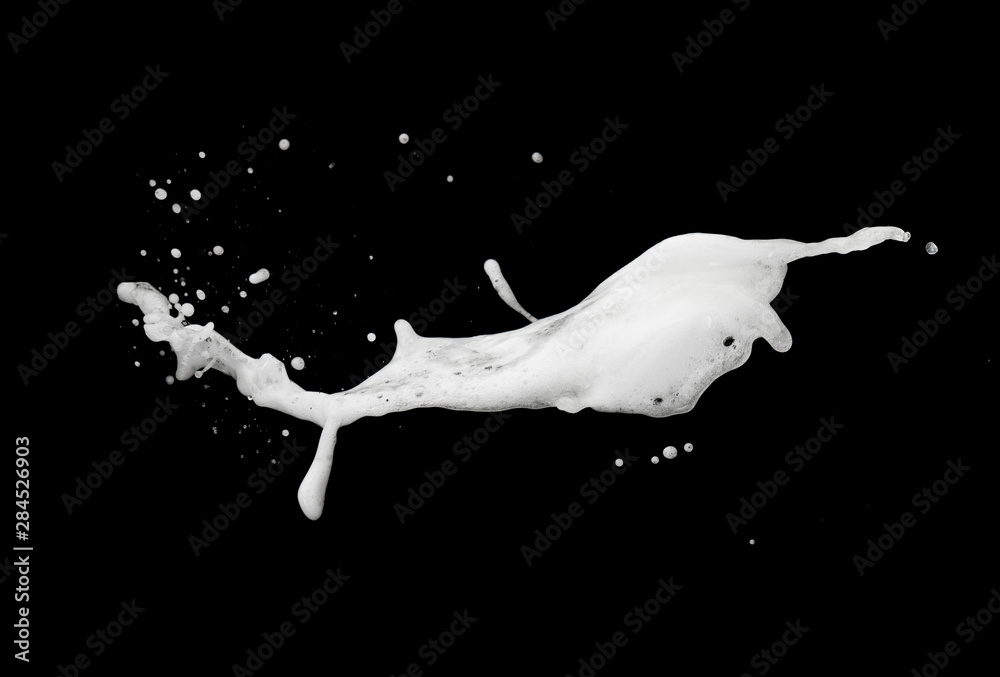 White foam bubble soap shampoo splash explosion in the air on black background,freeze stop motion photo object design - obrazy, fototapety, plakaty 
