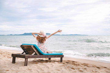 Wall Mural - Woman on beach in summer