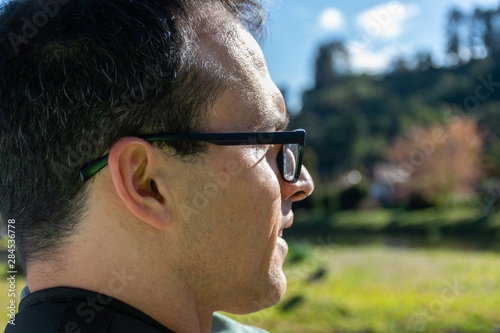 Side Face Closeup Of A 43 Year Old Man With Glasses Stock Photo Adobe Stock