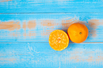 freshness Mandarin Oranges on wood table background, rich of Vitamin C and High Antioxidant. Organic Fruit and food Healthy concept