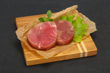 Raw tuna round steak for grill