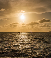 Wall Mural - Sunset over the sea from a house and swimming pool