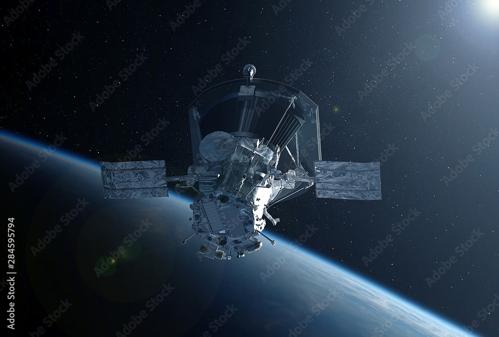 Large space satellite in space above the earth.  Elements of this image were furnished by NASA - obrazy, fototapety, plakaty 