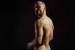 © Oleh Phoenix - Handsome sport sexy stripped guy portrait for cosmetics and fitness drops on isolated black background