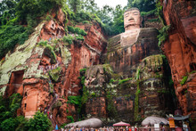 Full View Of The Leshan Giant Buddha Or Dafo From River Boat In Leshan China