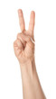 © Pixel-Shot - Female hand showing two fingers on white background