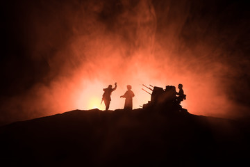 War Concept. Military silhouettes fighting scene on war fog sky background,