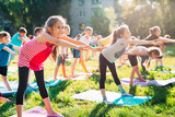 Yoga classes outside on the open air. Kids Yoga,