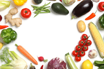 Frame made of different fresh vegetables on white background, top view. Space for text