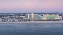 Aerial Over Daytona Beach At Sunrise. Hotels And Condominiums Line The Beachfront.  Florida, USA