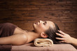 © Valua Vitaly - Masseur doing massage the head and hair for an woman in spa salon