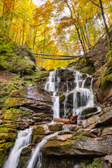 Wall Mural - Waterfall Shypit in the autumn forest in Carpathian mountains, Ukraine